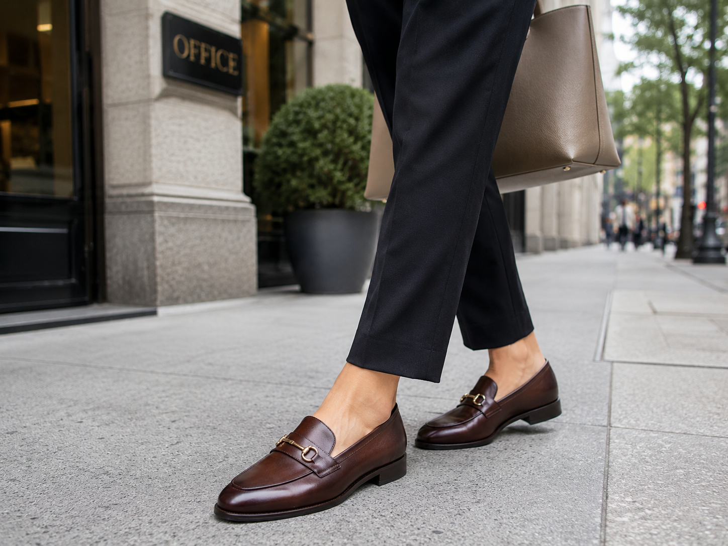 Office Shoes for women - Stylish leather loafers on a city sidewalk