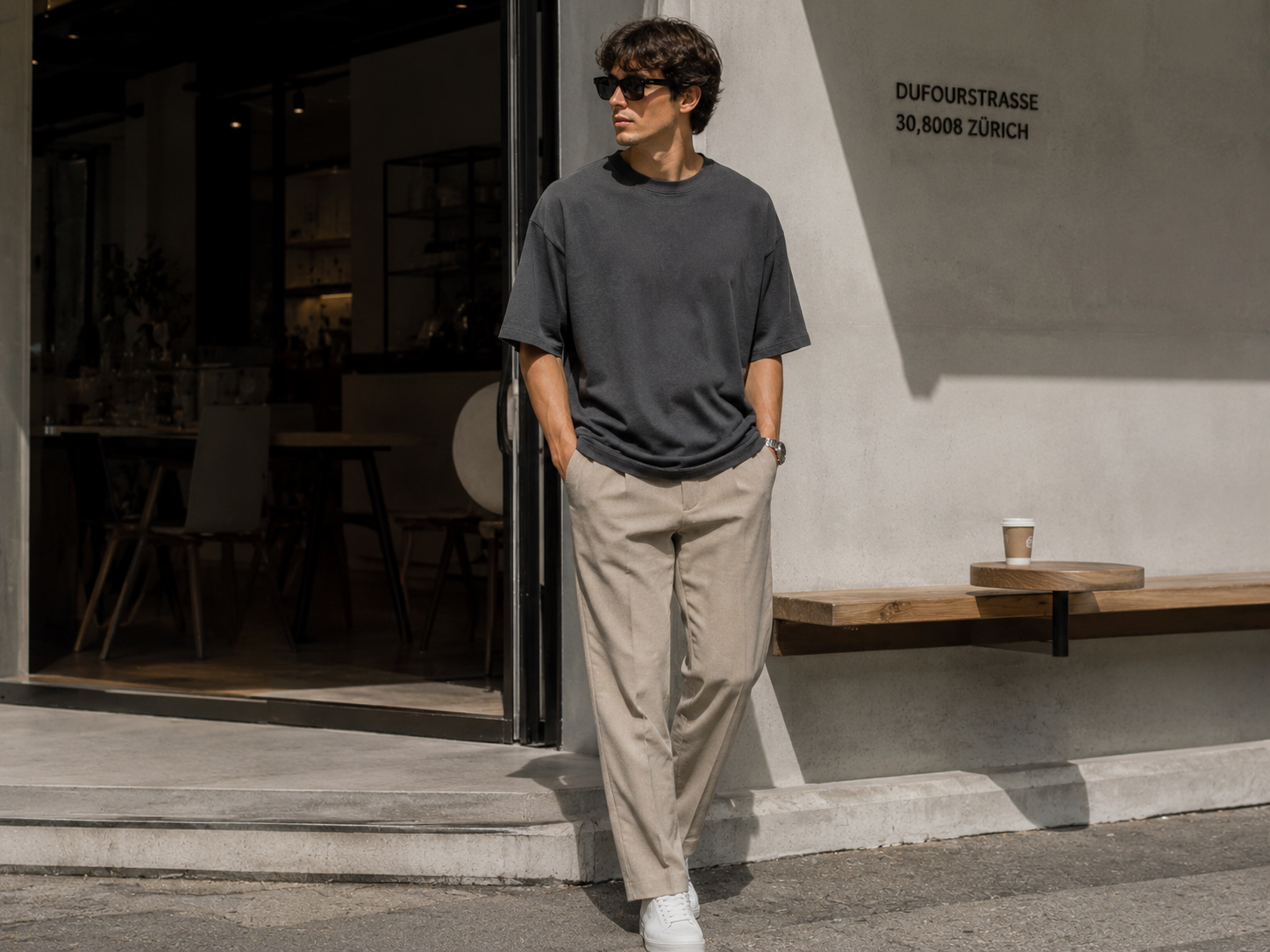 Men's oversized t-shirt paired with tailored trousers for a smart casual look